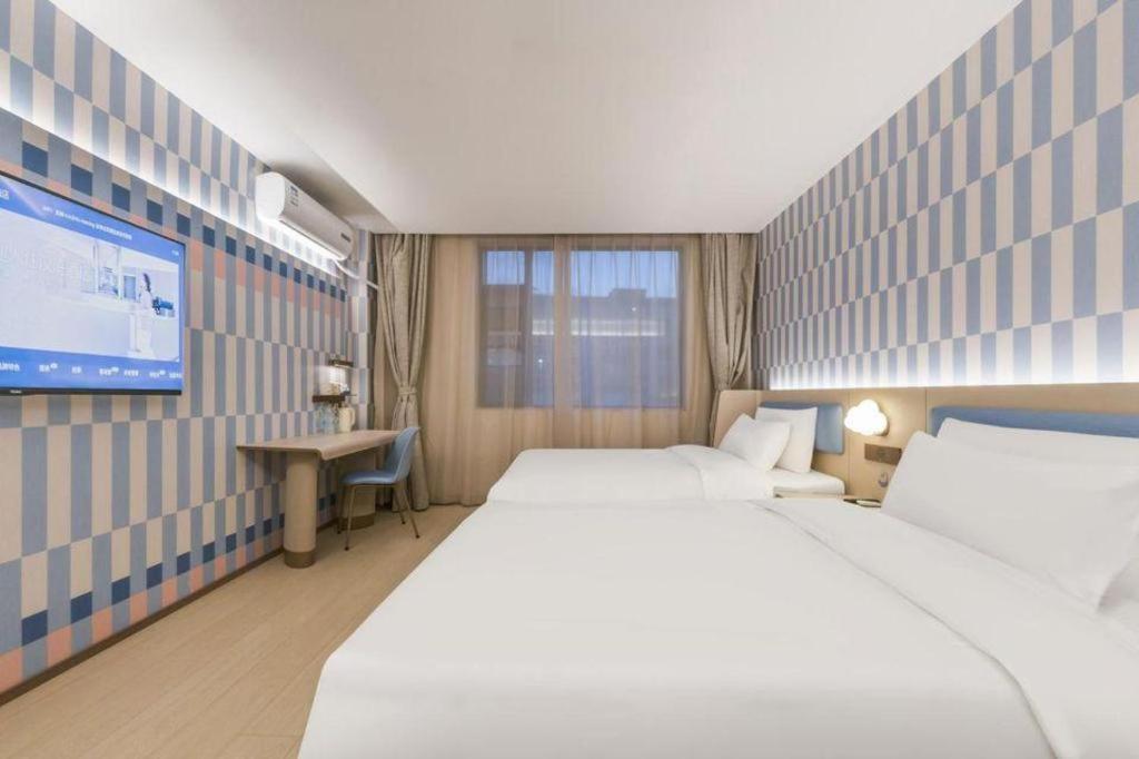 Hanting Zhenping Road Railway Station New Hotel 2*